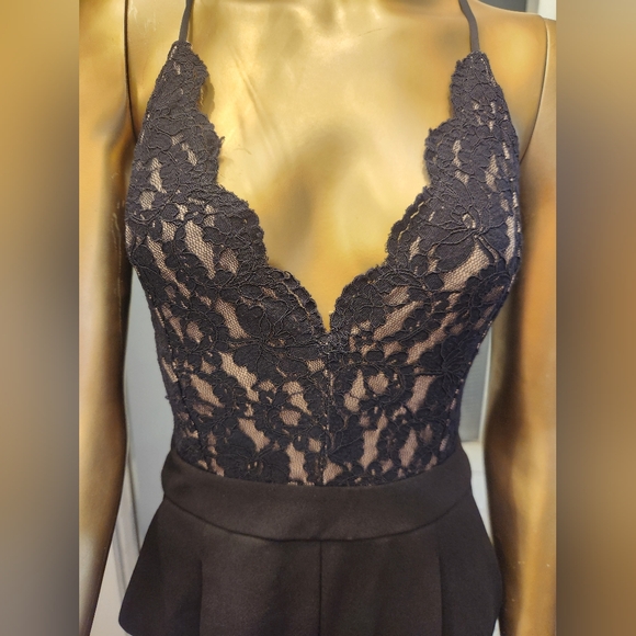 Express Black Jumpsuit with Elegant Lace Detailing - Picture 2 of 16